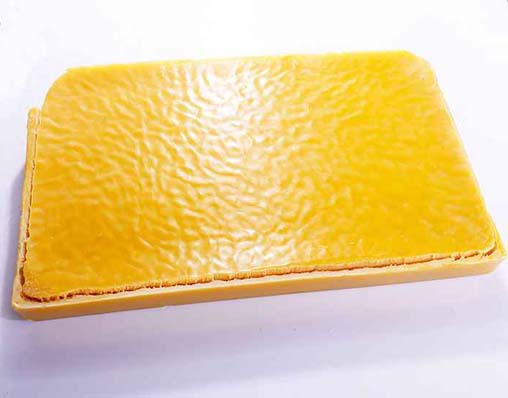 Tillverkare av gula bivaxplattor